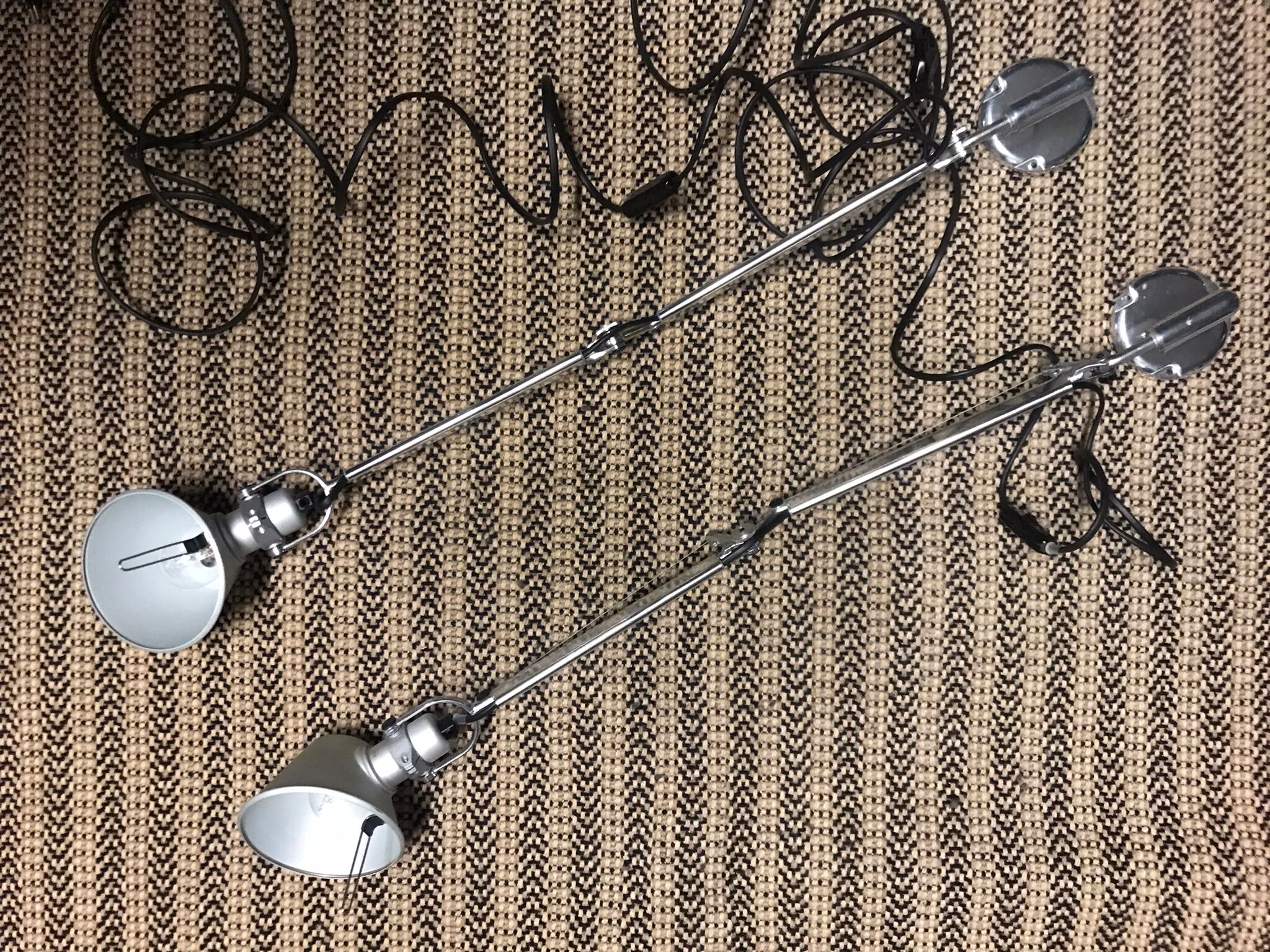 Pair of Tolomeo Tavolo lamps with their wall mount