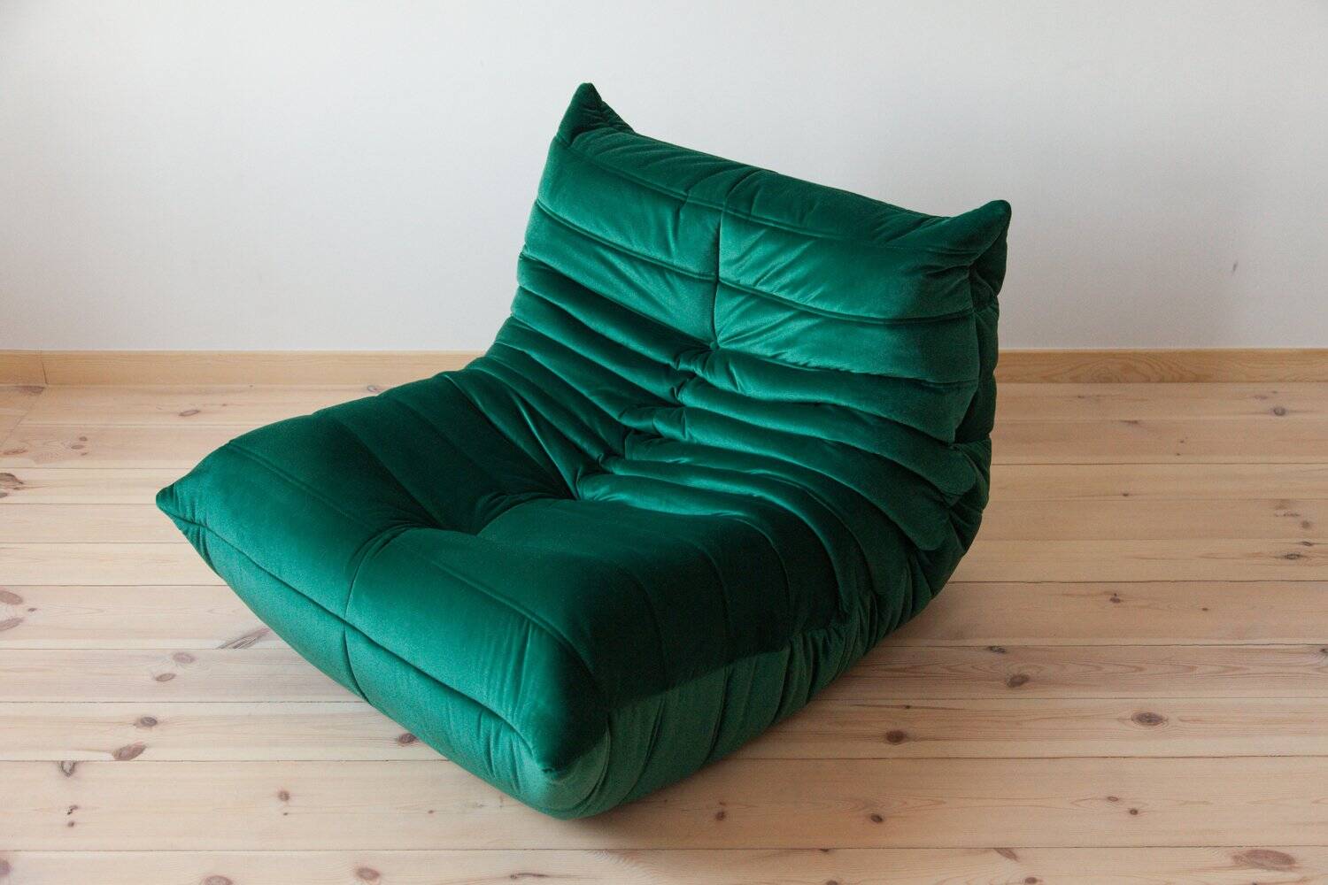 Togo lounge chair in bottle green velvet by Michel Ducaroy for Ligne Roset