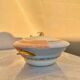 Antique Limoges porcelain soup tureen with two decorations.