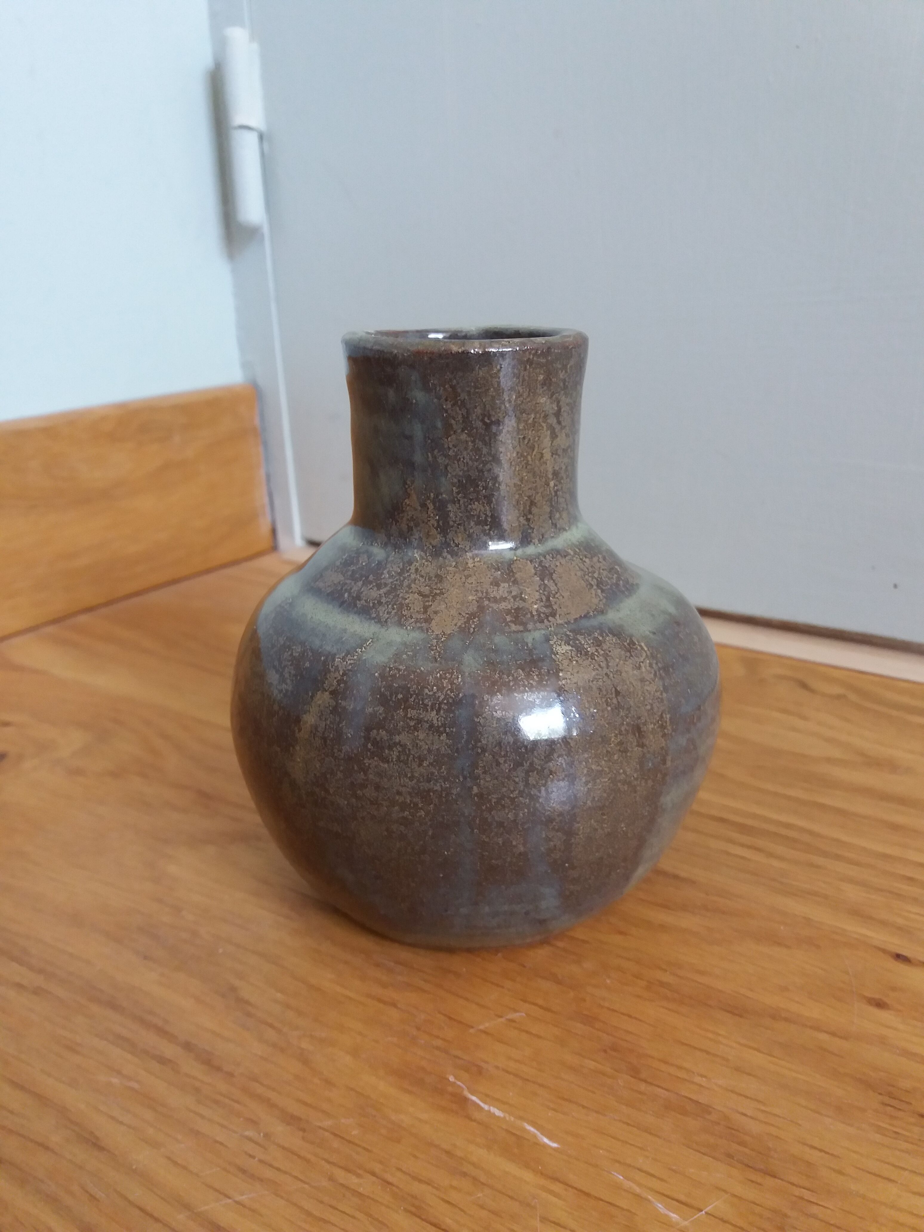 Enamelled stoneware vase signed