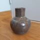 Enamelled stoneware vase signed