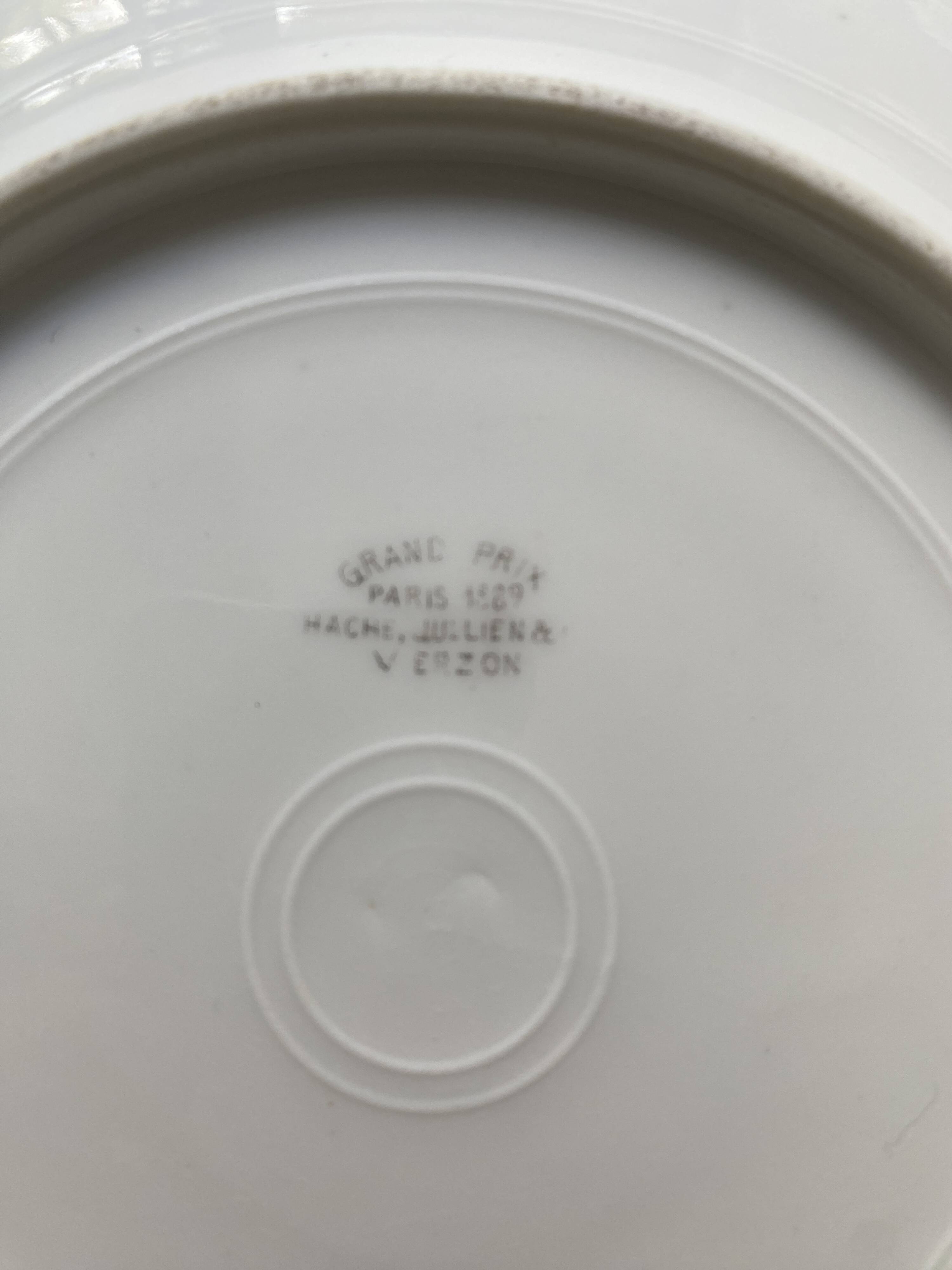 12 vintage porcelain dessert plates signed hache, julien & cie birds