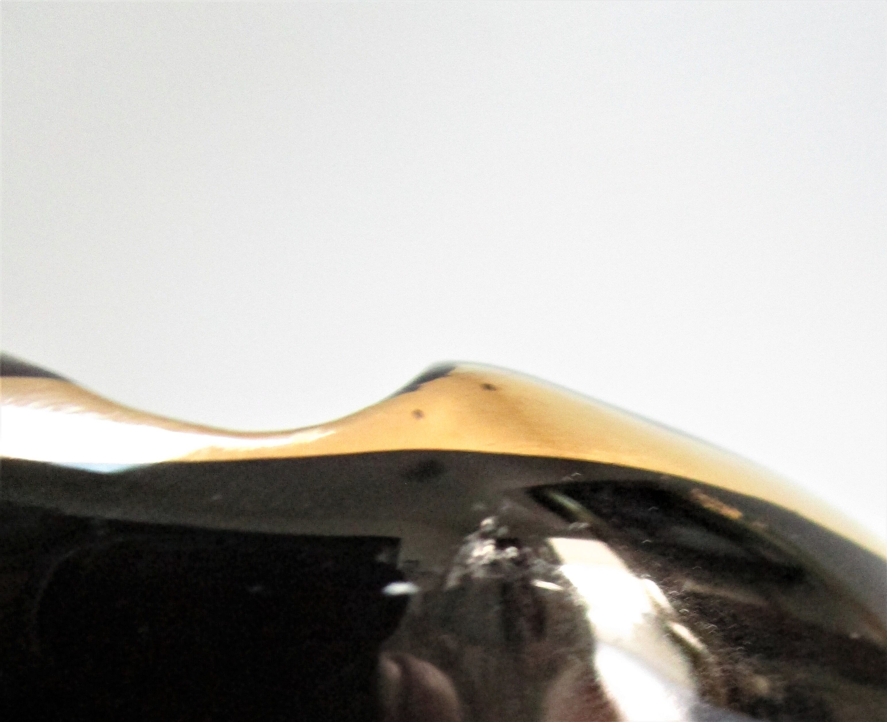Black ceramic ashtray and vintage gold 50/60