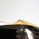 Black ceramic ashtray and vintage gold 50/60