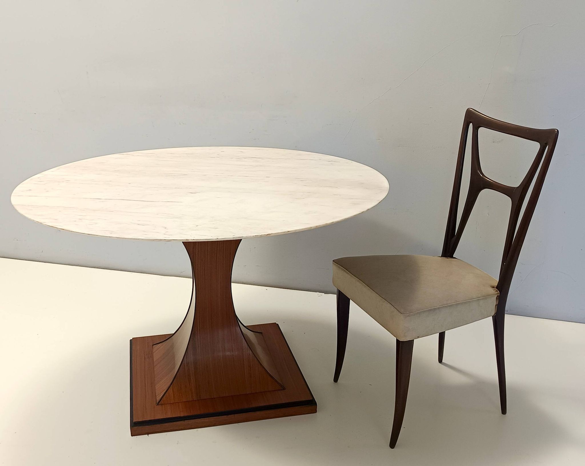 Dining Table with a Portuguese Pink Marble Top in the style of Carlo De Car