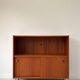Vintage wooden cabinet with sliding doors