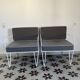 Vintage white metal Croisette style armchairs with hairpin legs in superb condition