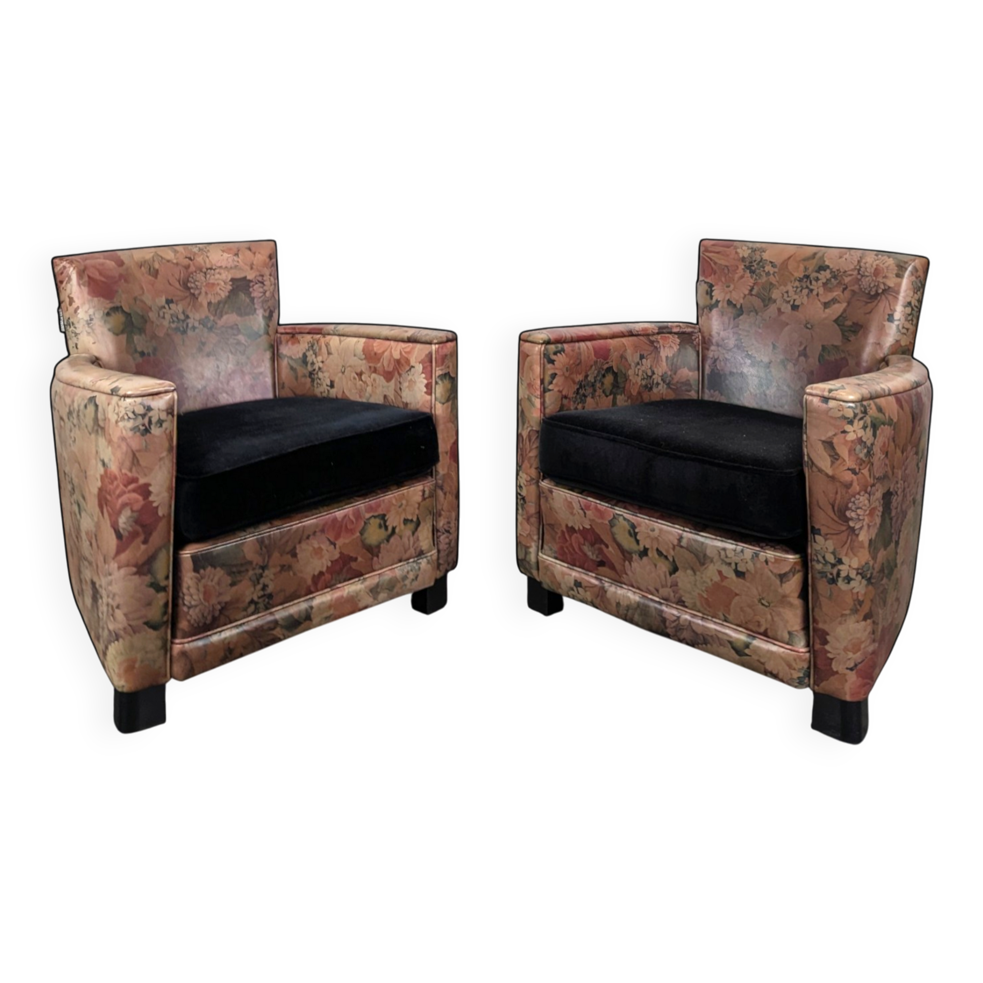 Pair of Roche Bobois armchairs with floral patterns.