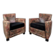 Pair of Roche Bobois armchairs with floral patterns.