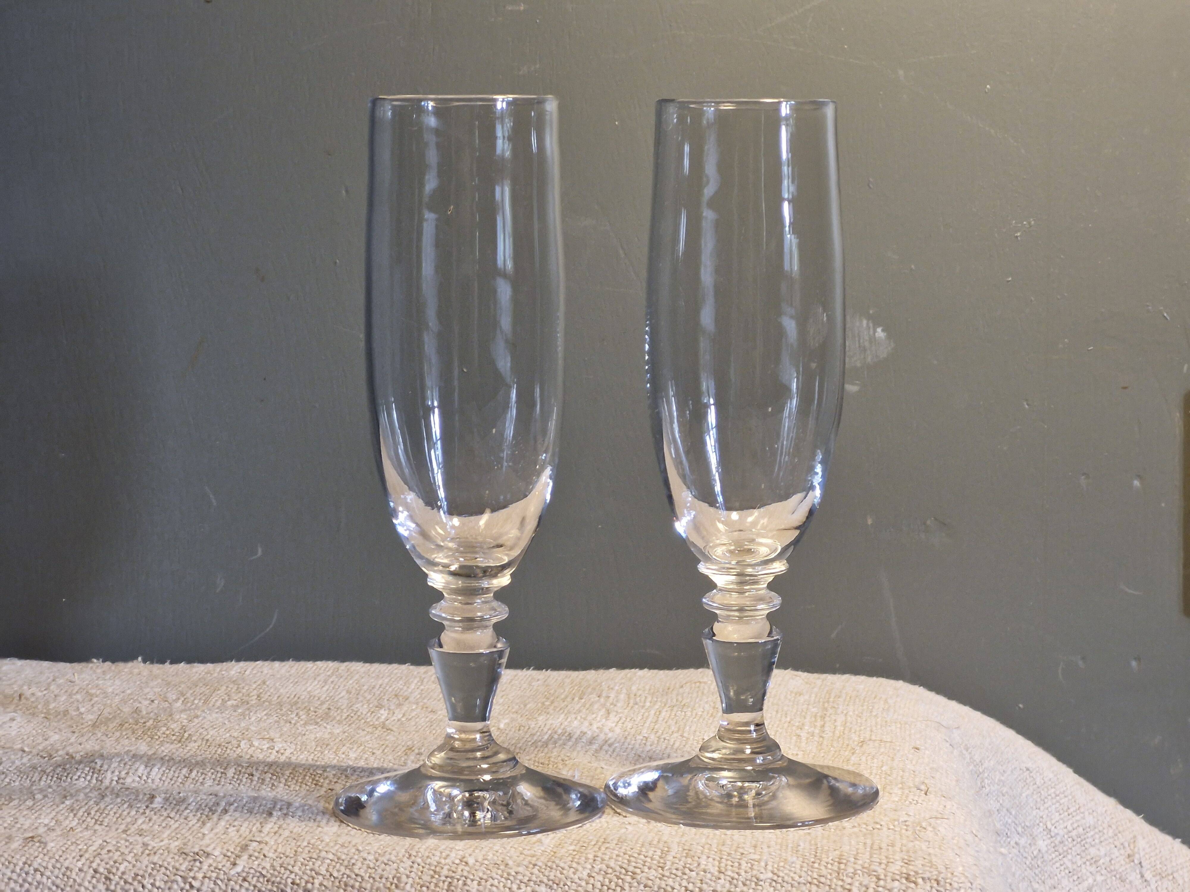 2 antique crystal champagne flutes