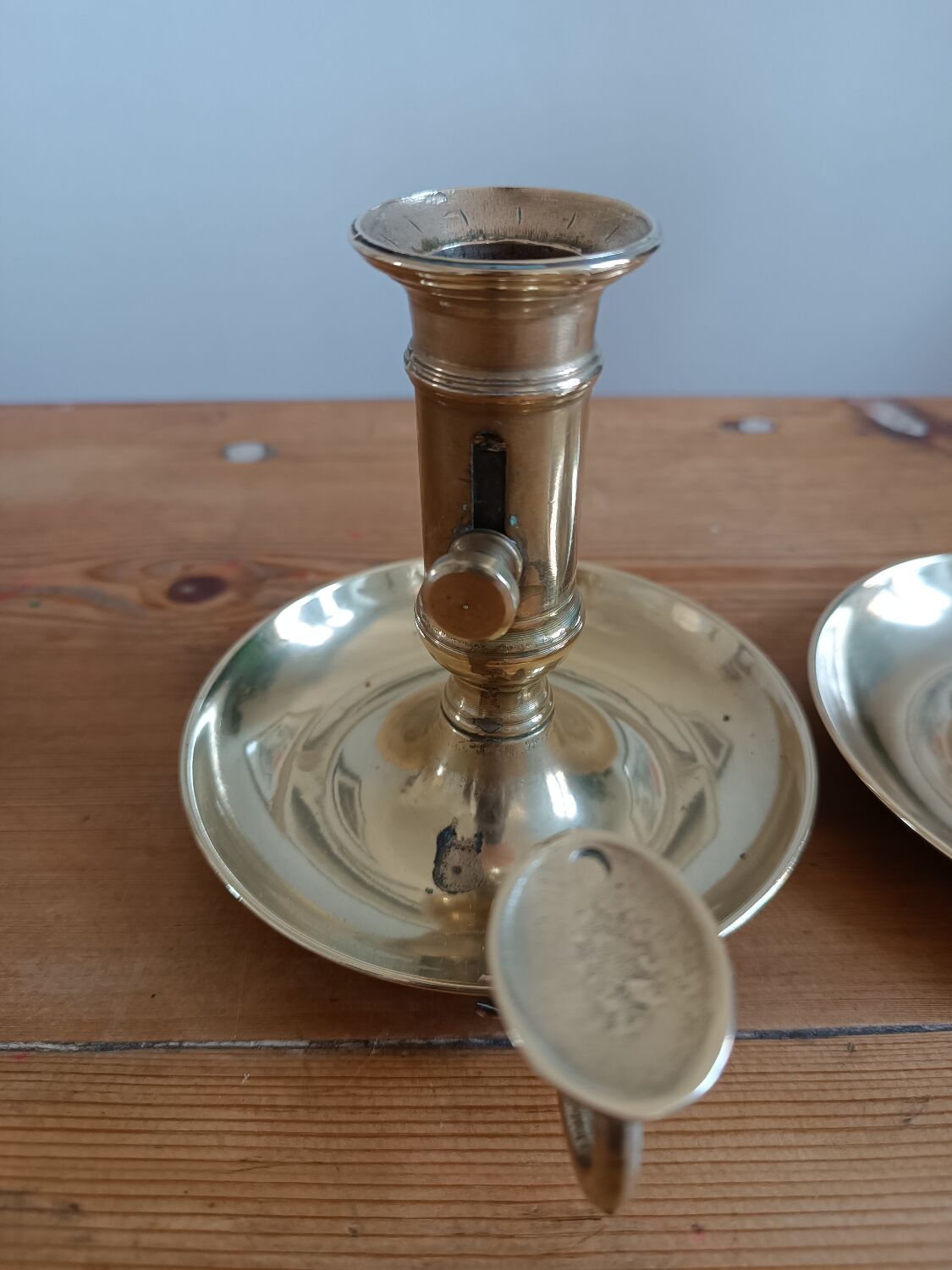 Duo of gilded brass cellar rat candlesticks