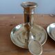 Duo of gilded brass cellar rat candlesticks