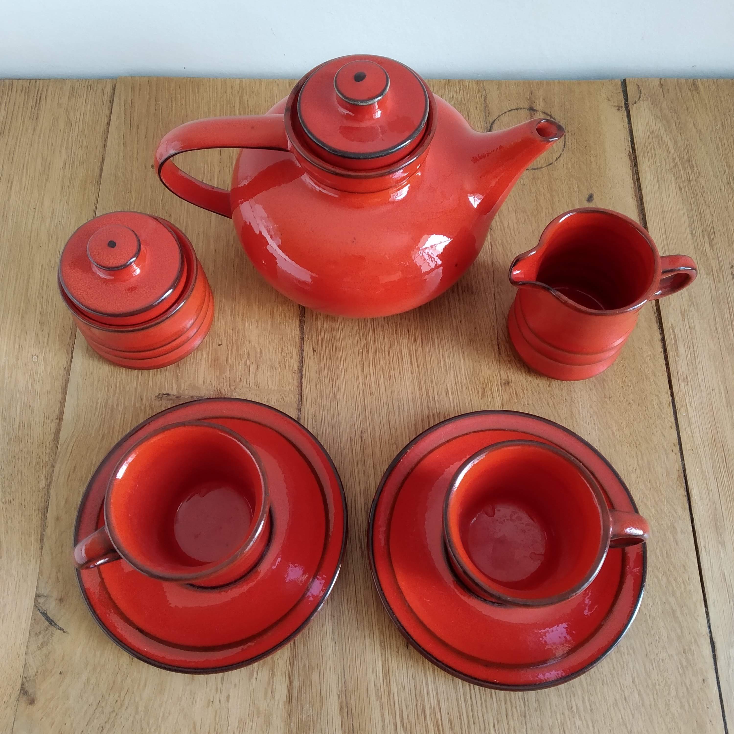 Red ceramic tea service