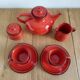 Red ceramic tea service