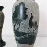Set of two carved stone vases