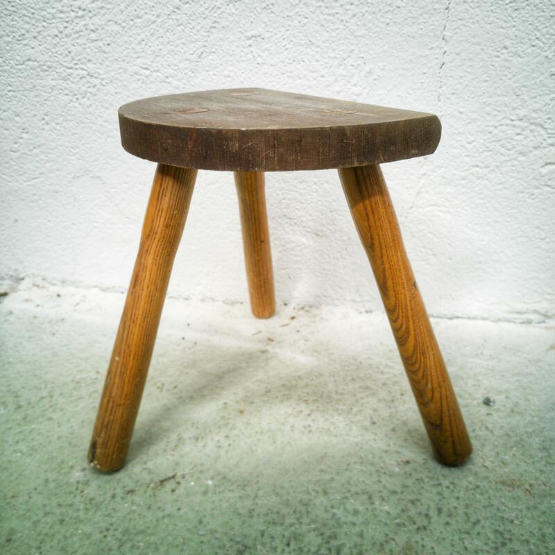 Tripod cowhide tabouret