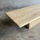 Light beige travertine Italian minimalist coffee table, solid natural stone 1980s