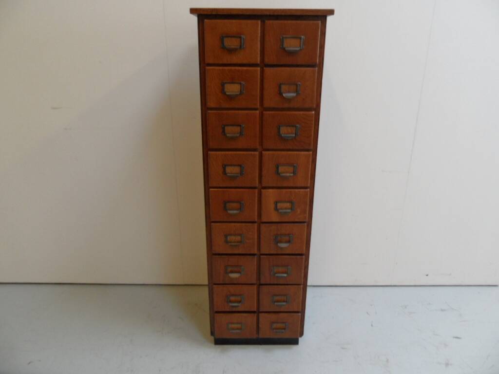 Antique oak apothecary cabinet with drawers