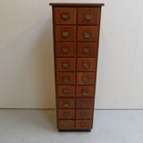 Antique oak apothecary cabinet with drawers
