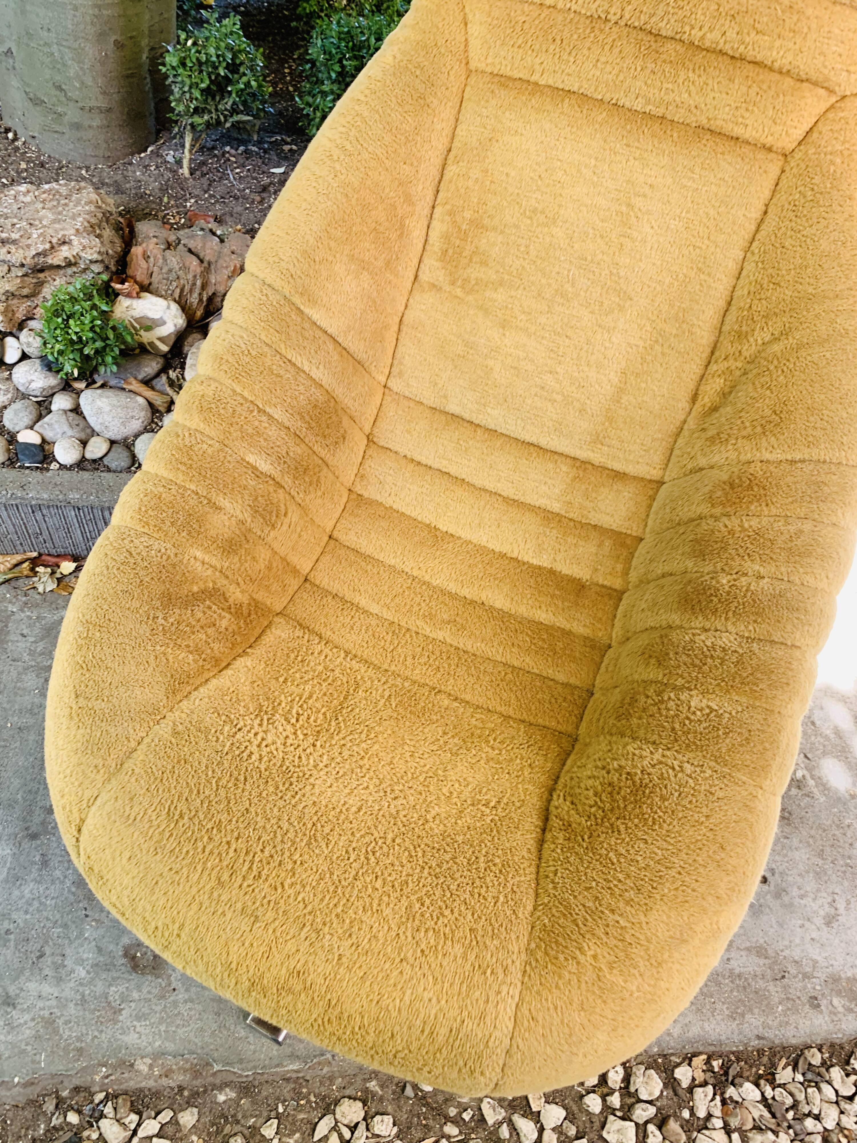 Space age mustard armchair