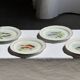 Set of 6 vintage Limoges porcelain plates with fish design.