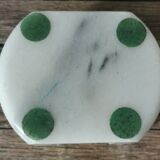 Ashtray and marble under glass