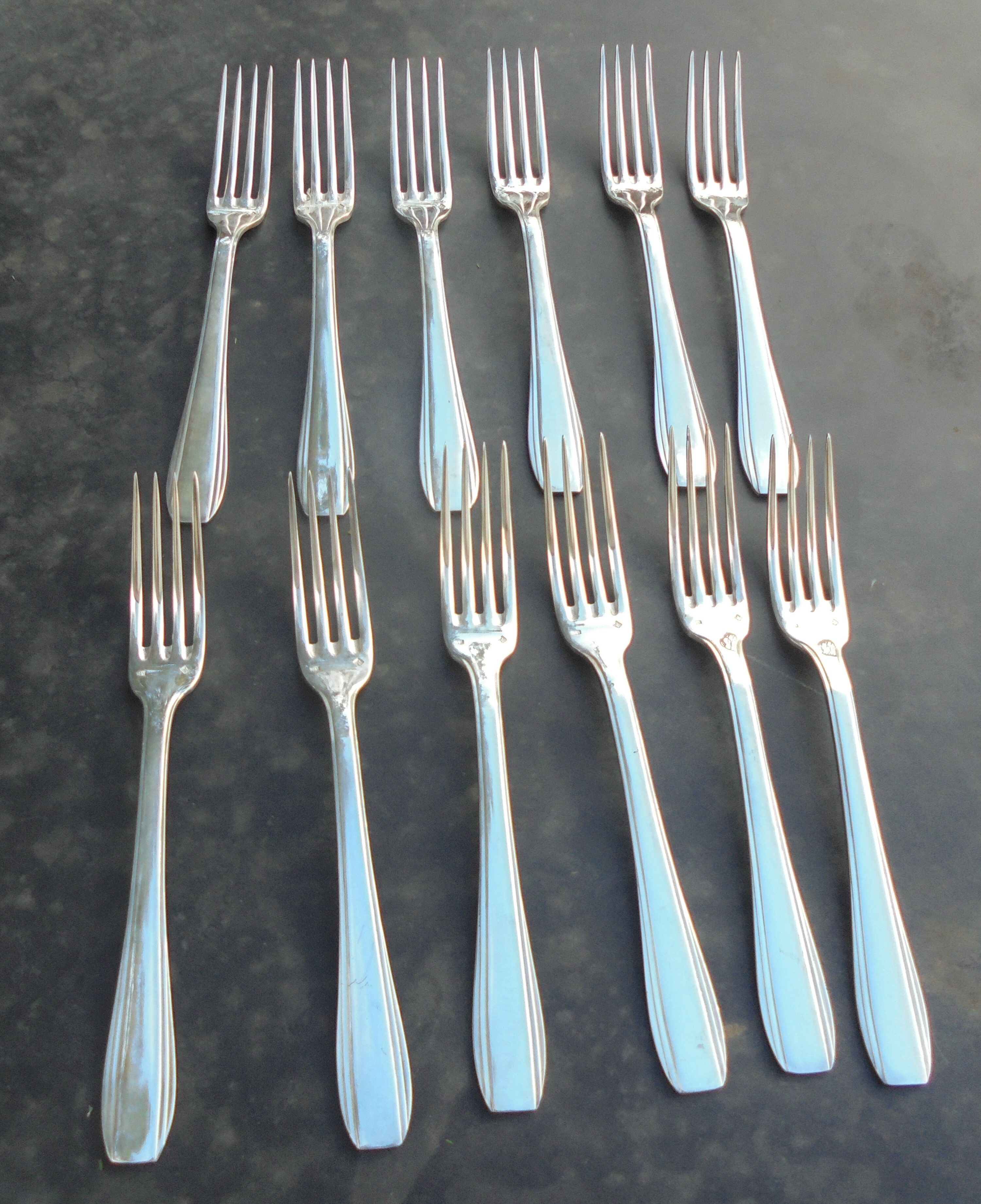 12 Art Deco silver metal forks