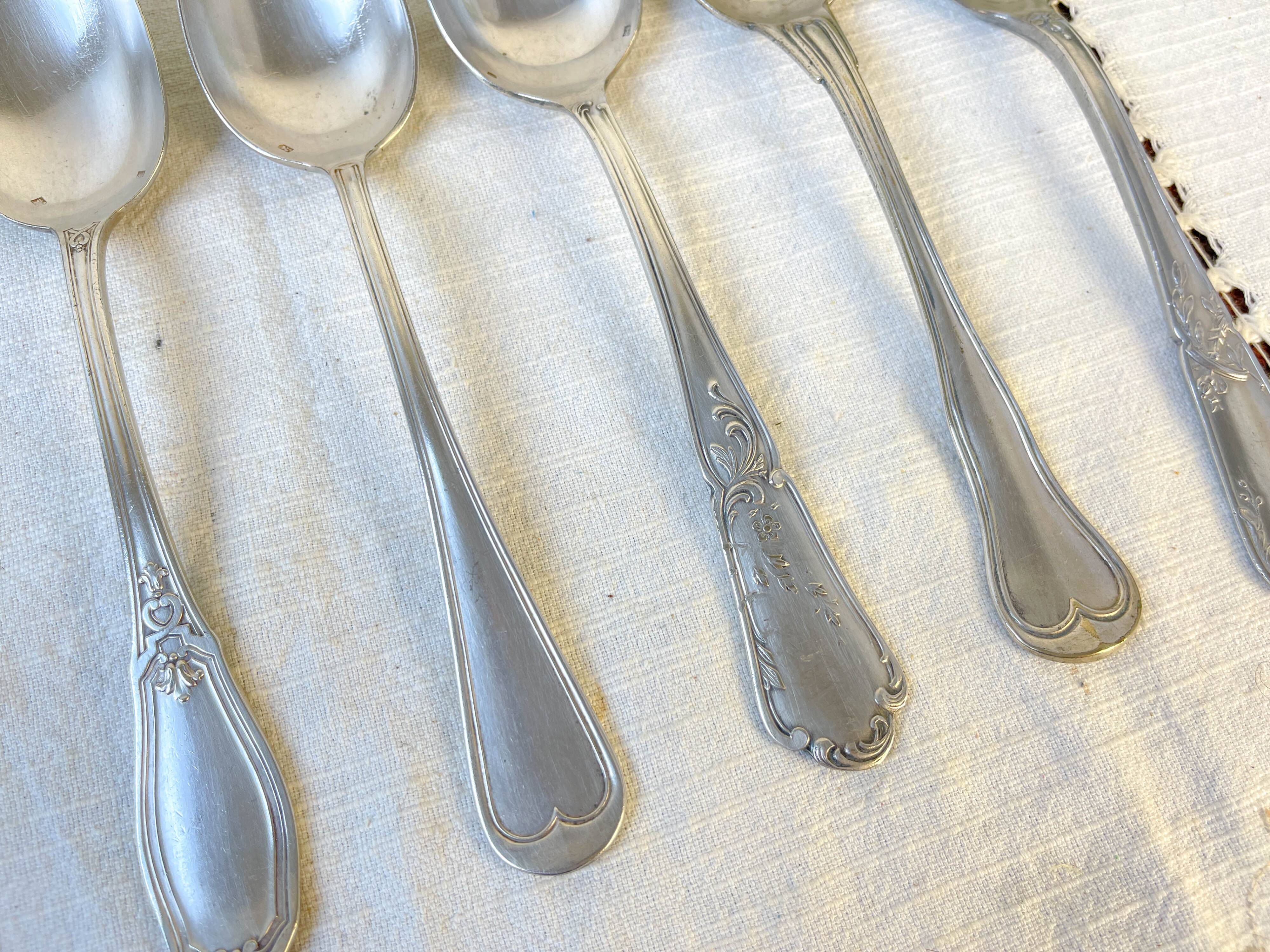 Set of 6 mismatched vintage soup spoons