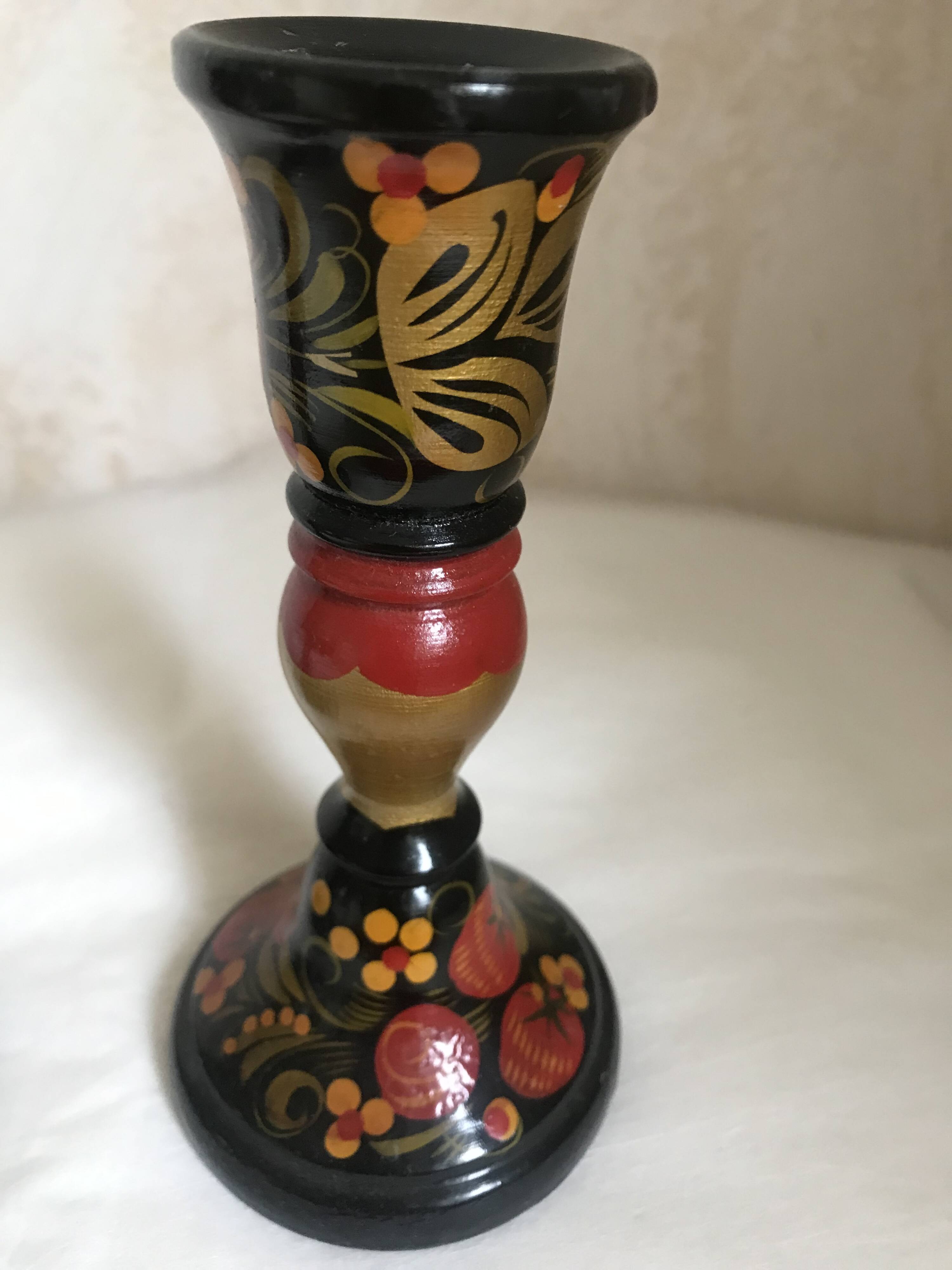 Varnished wooden candle holders