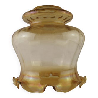 Large mid-century amber glass light shade with ribbed effect and frilled edge.