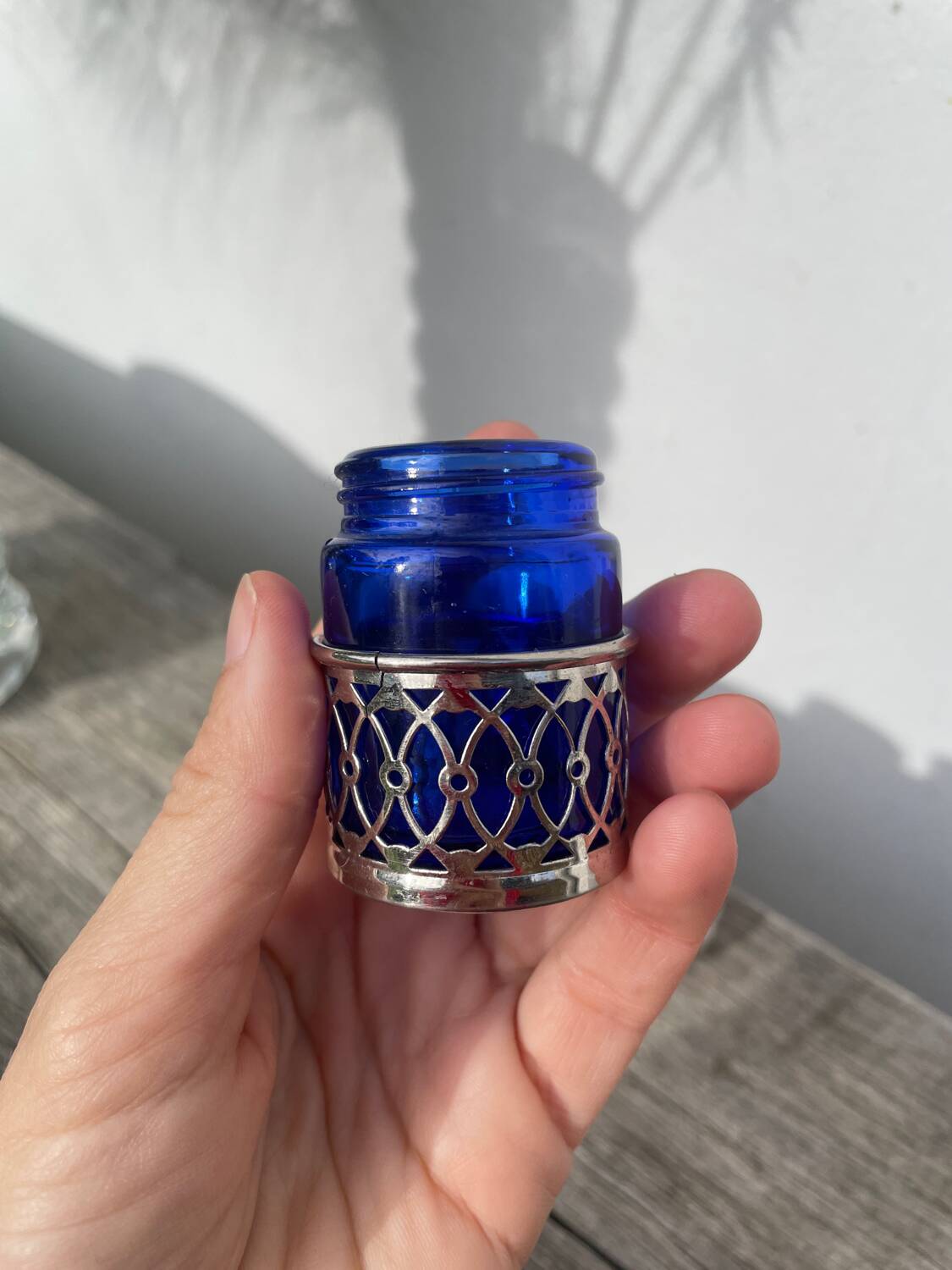 Silver-plated metal and blue glass salt and pepper shaker
