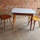 Together two Scandinavian chairs and its wooden and formica table