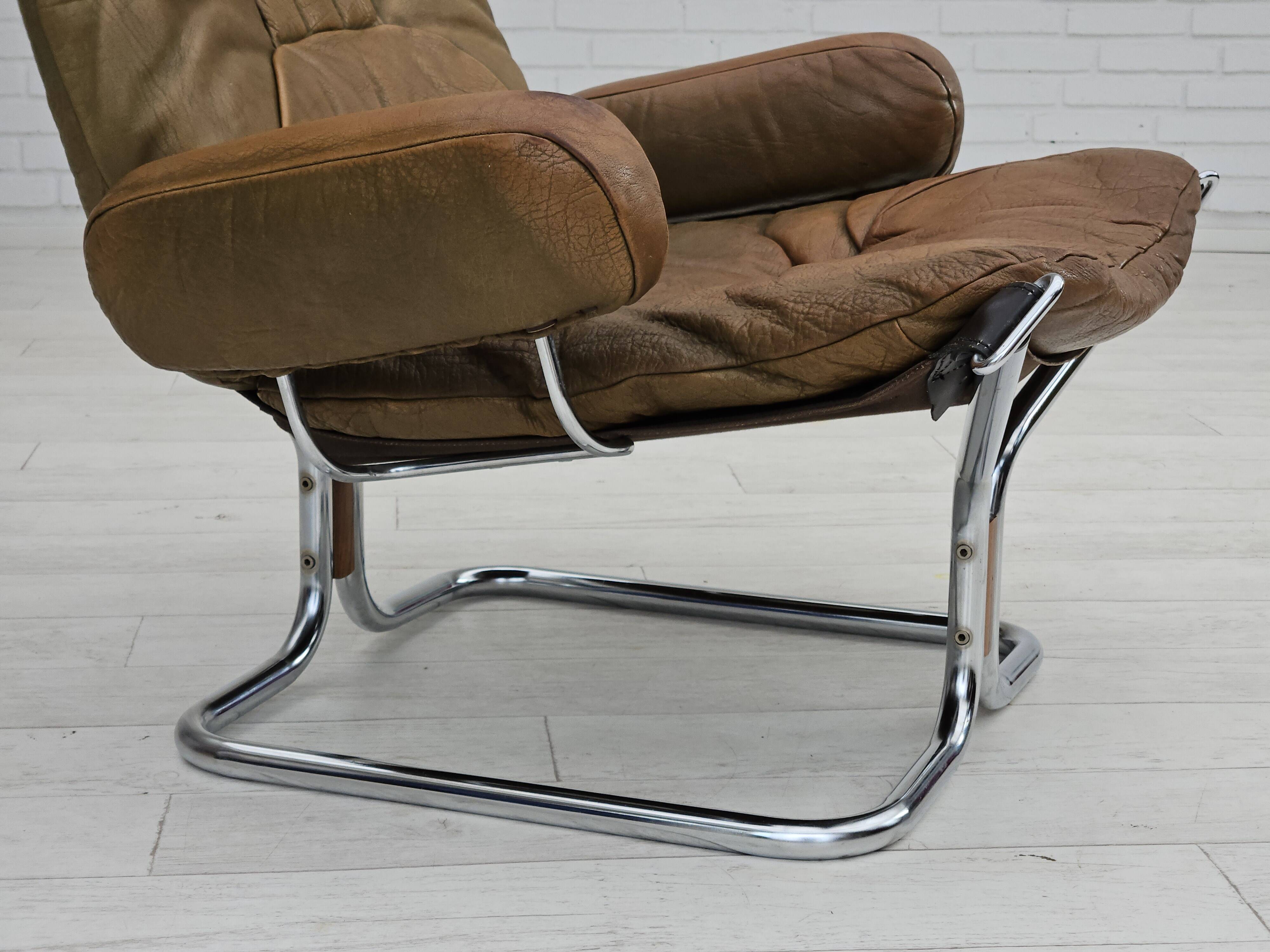 1970s, Norwegian design by Harald Relling, original condition, leather, chrome steel, teak wood.