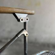 Set of two vintage folding chairs with an aluminium wire frame.
