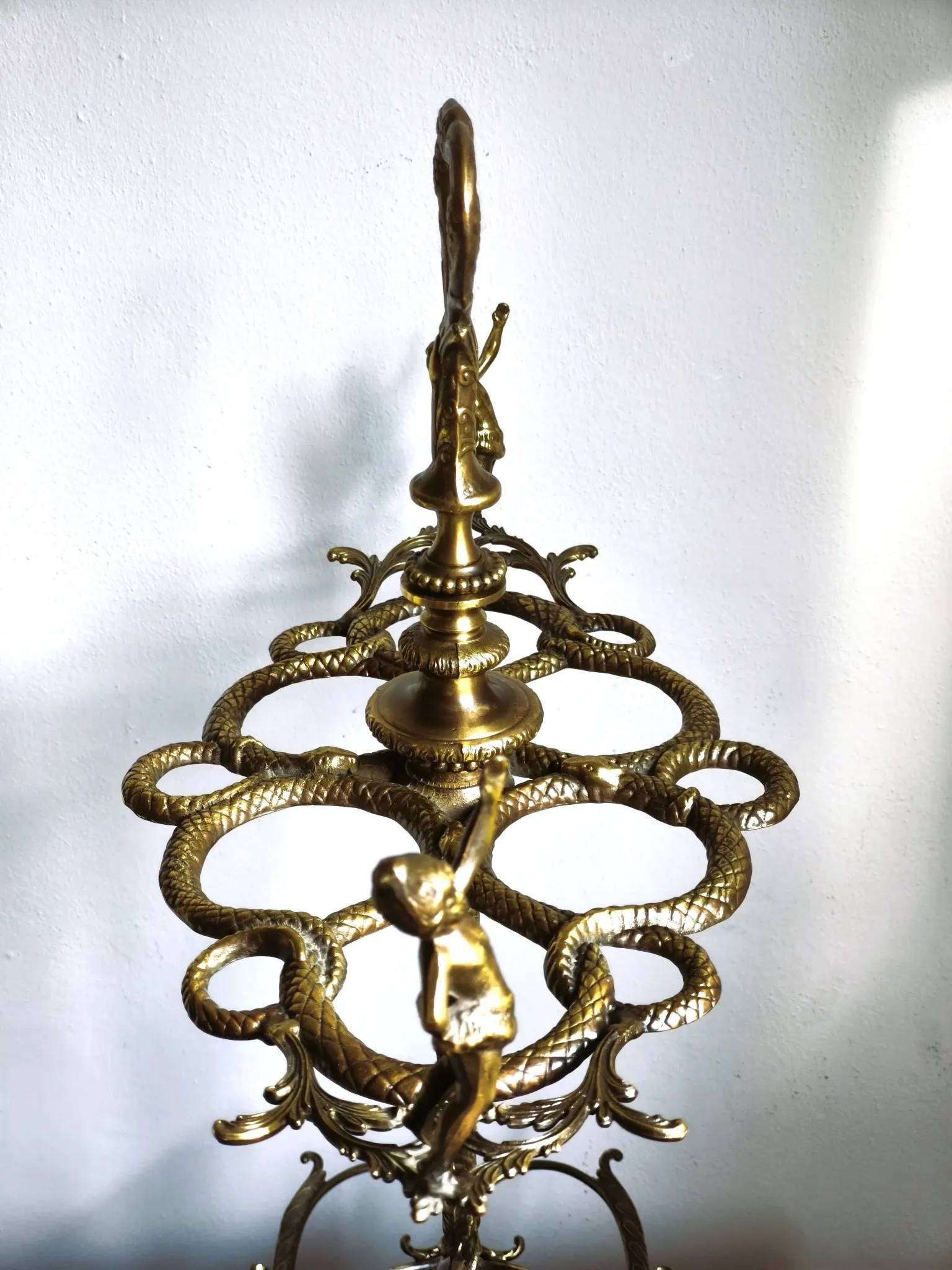 Italian brass umbrella stand, Art Nouveau style, with putti.