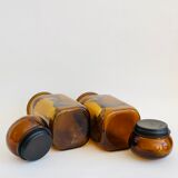 Pair of vintage amber glass jars