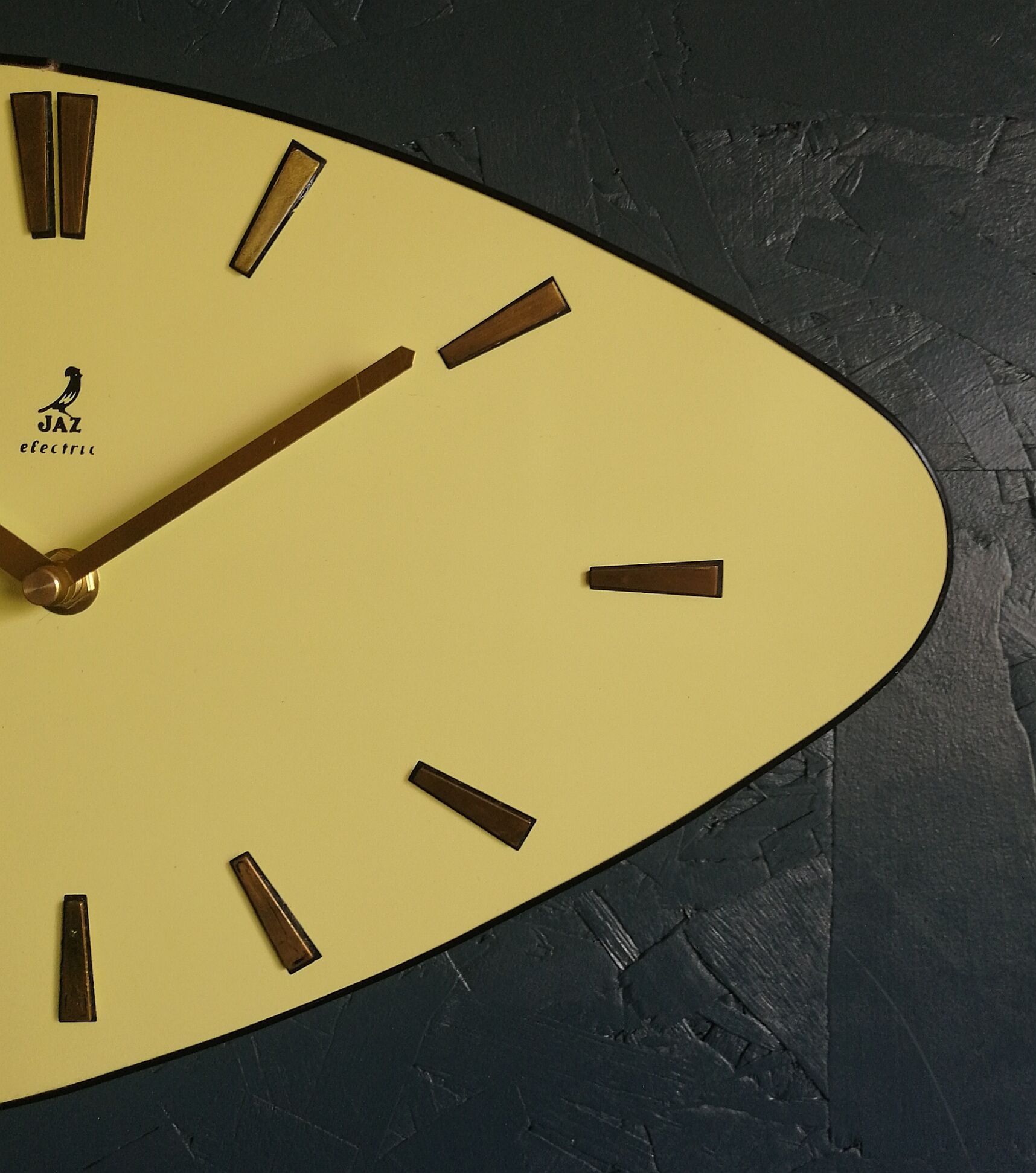 Vintage formica clock asymmetrical silent wall clock "Golden yellow Jaz"