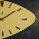 Vintage formica clock asymmetrical silent wall clock "Golden yellow Jaz"