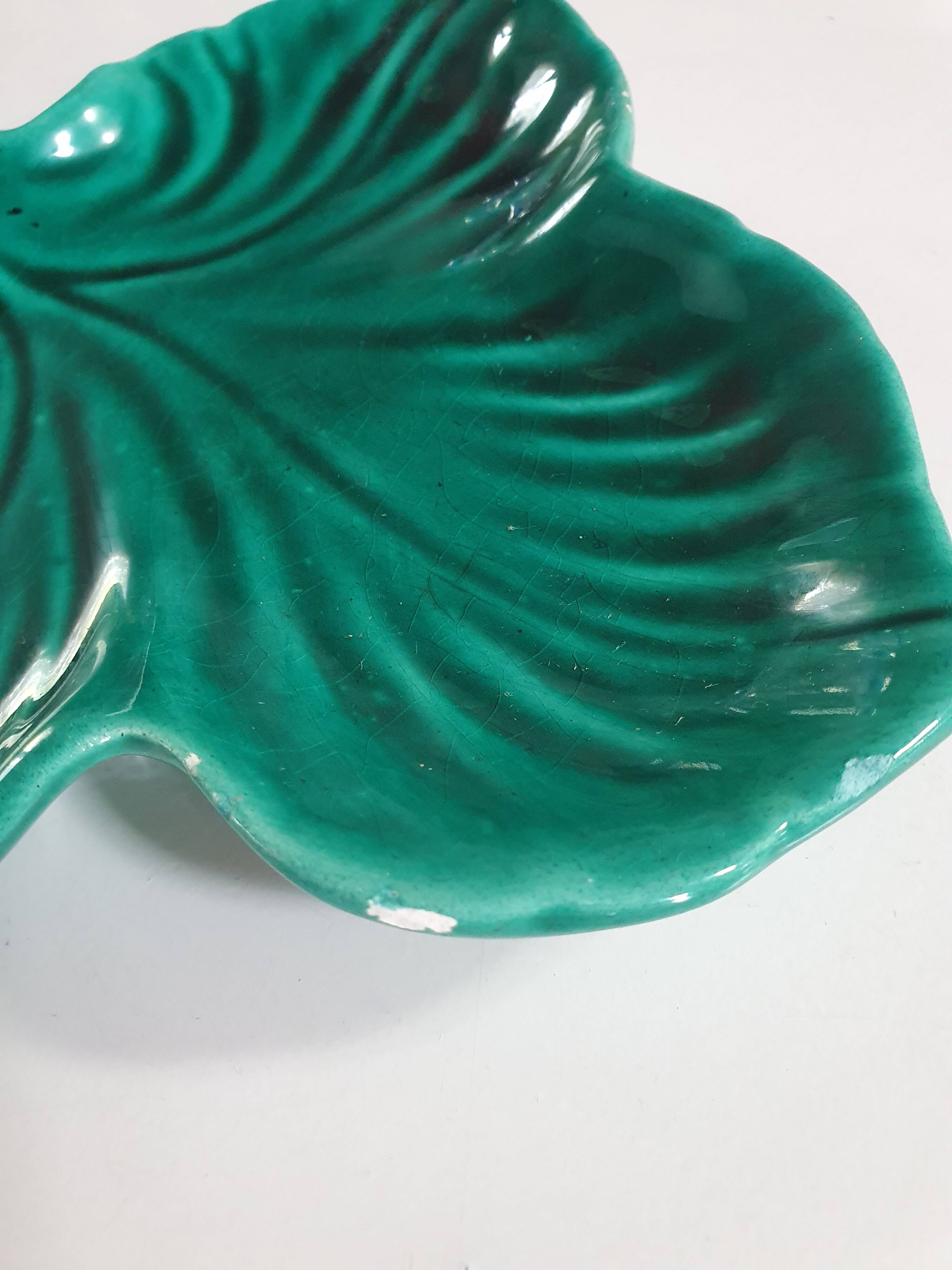 empty pocket cup leaf shape green ceramic slip, some chips on one edge