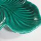 empty pocket cup leaf shape green ceramic slip, some chips on one edge
