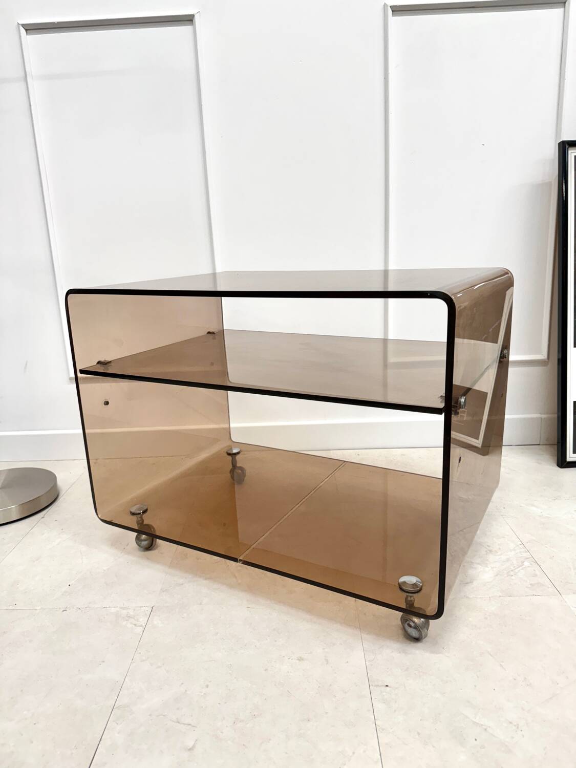 Smoked plexiglass coffee table