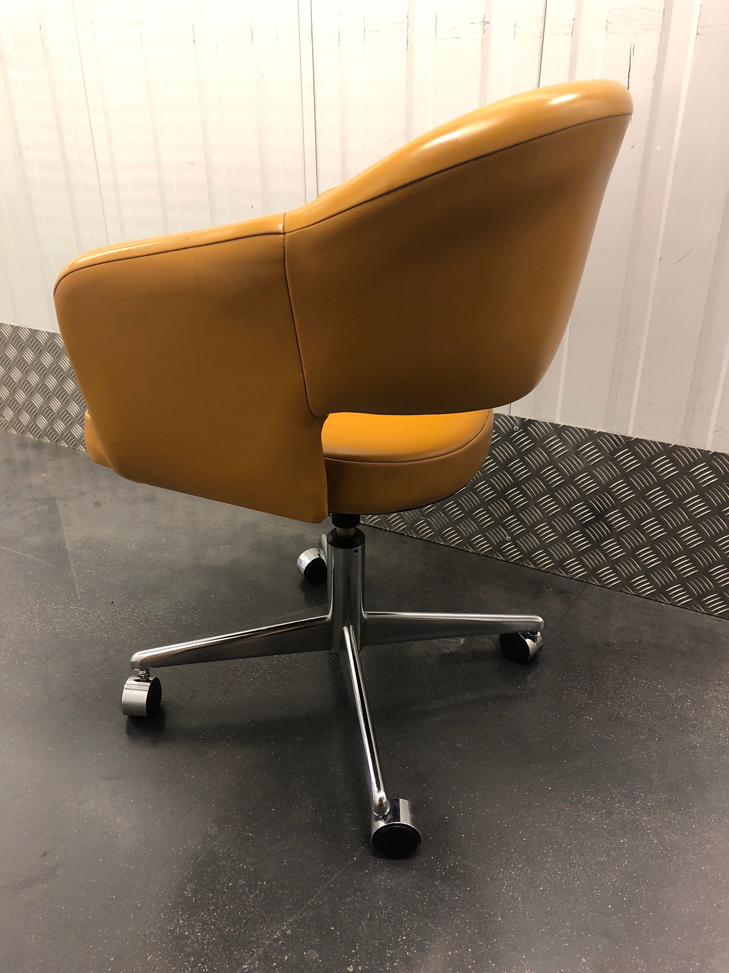 Vintage office chair in mustard yellow skai circa 1960