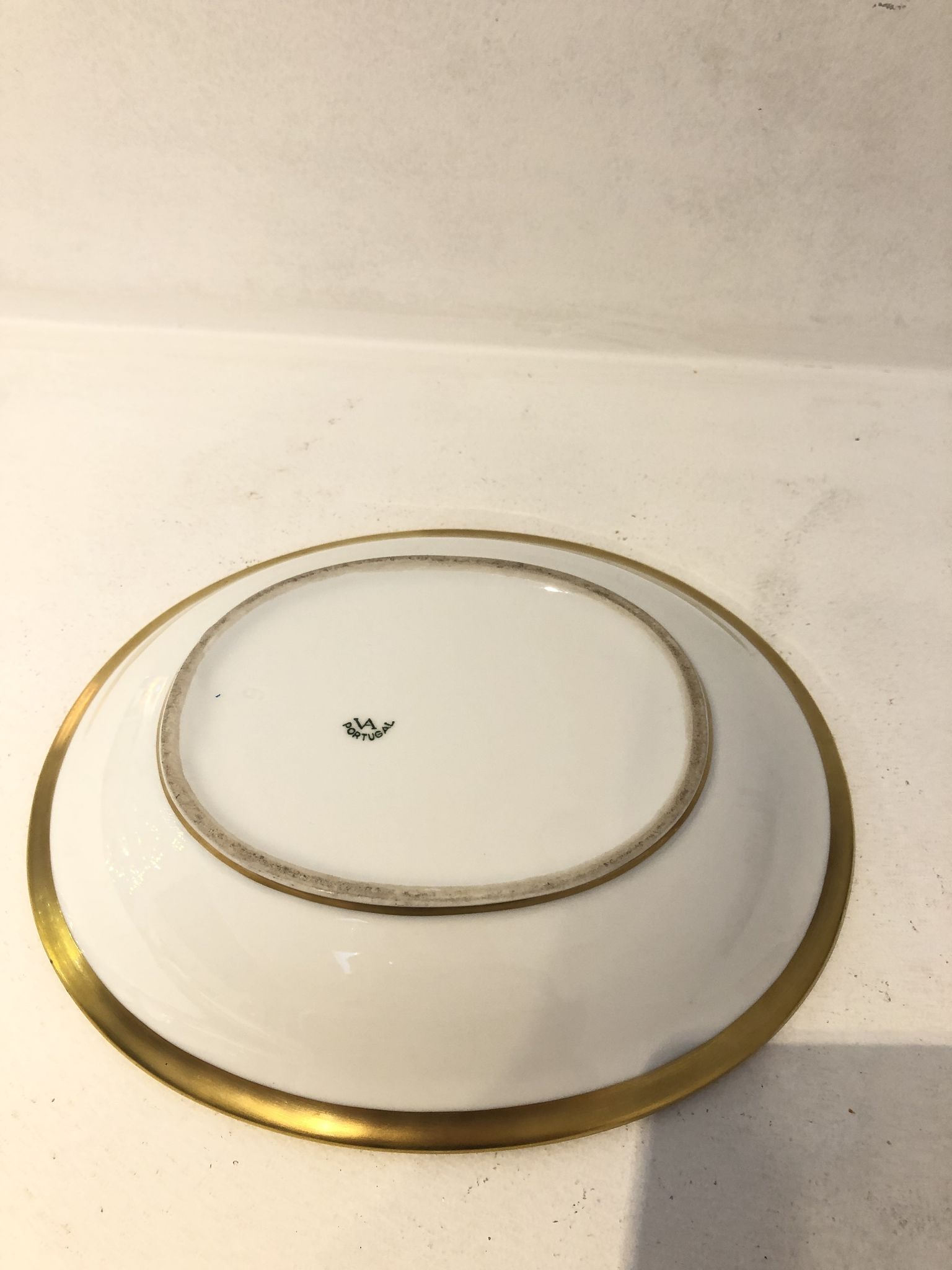 Plat oval doré en porcelaine 1950