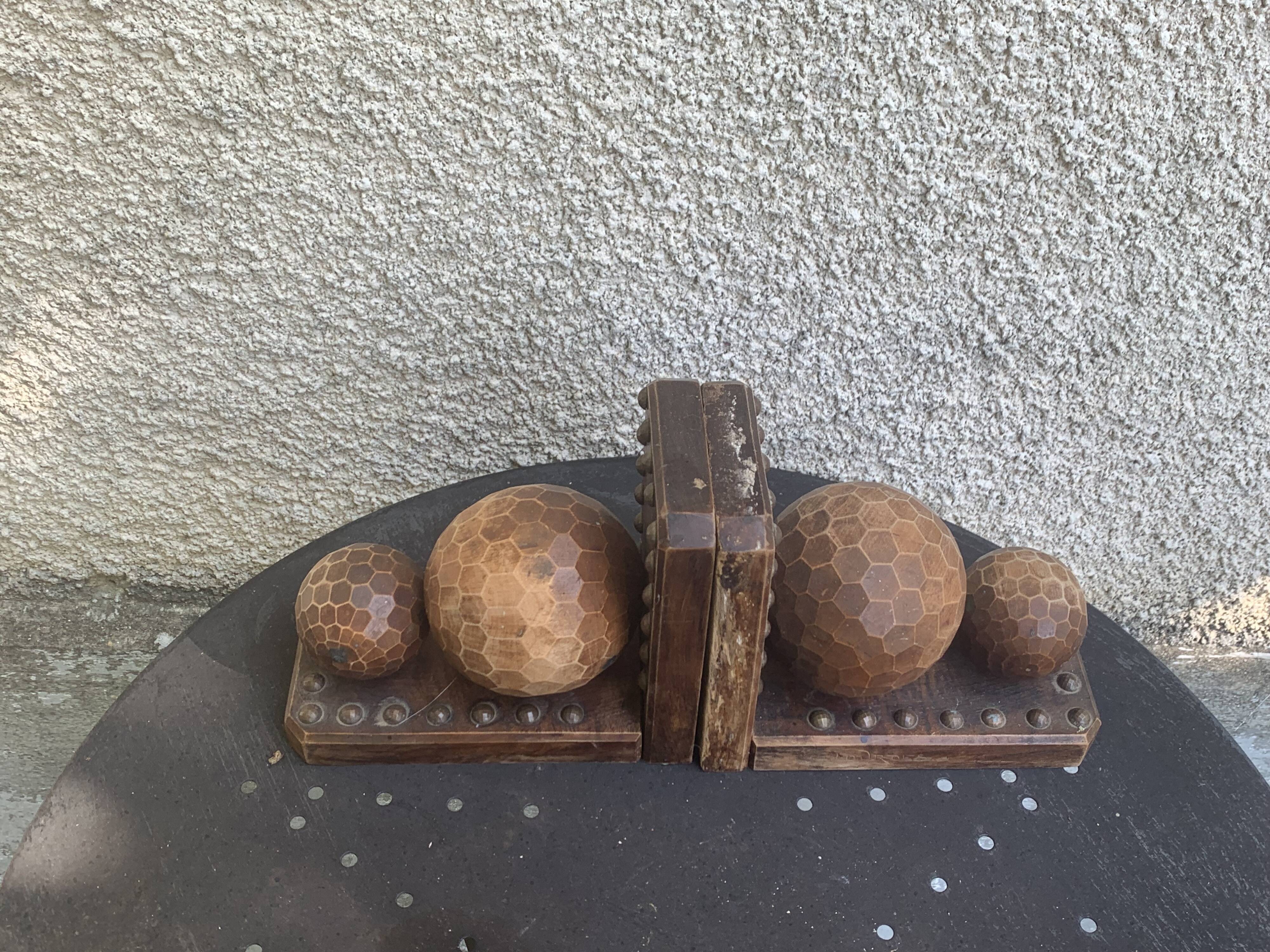 Pair of vintage carved wood and metal ball bookends