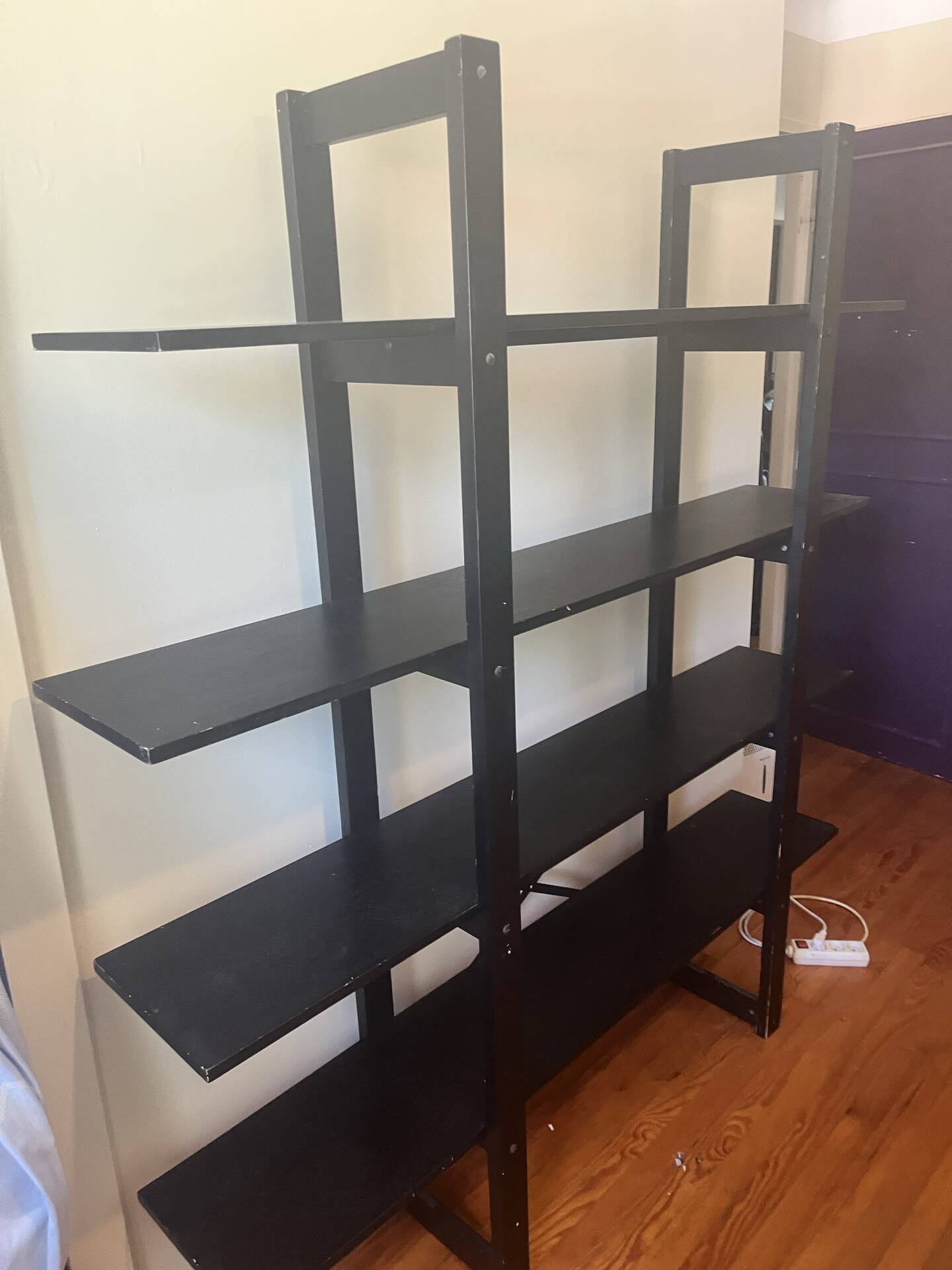 Large vintage bookshelf in solid black wood, Scandinavian style.