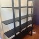 Large vintage bookshelf in solid black wood, Scandinavian style.