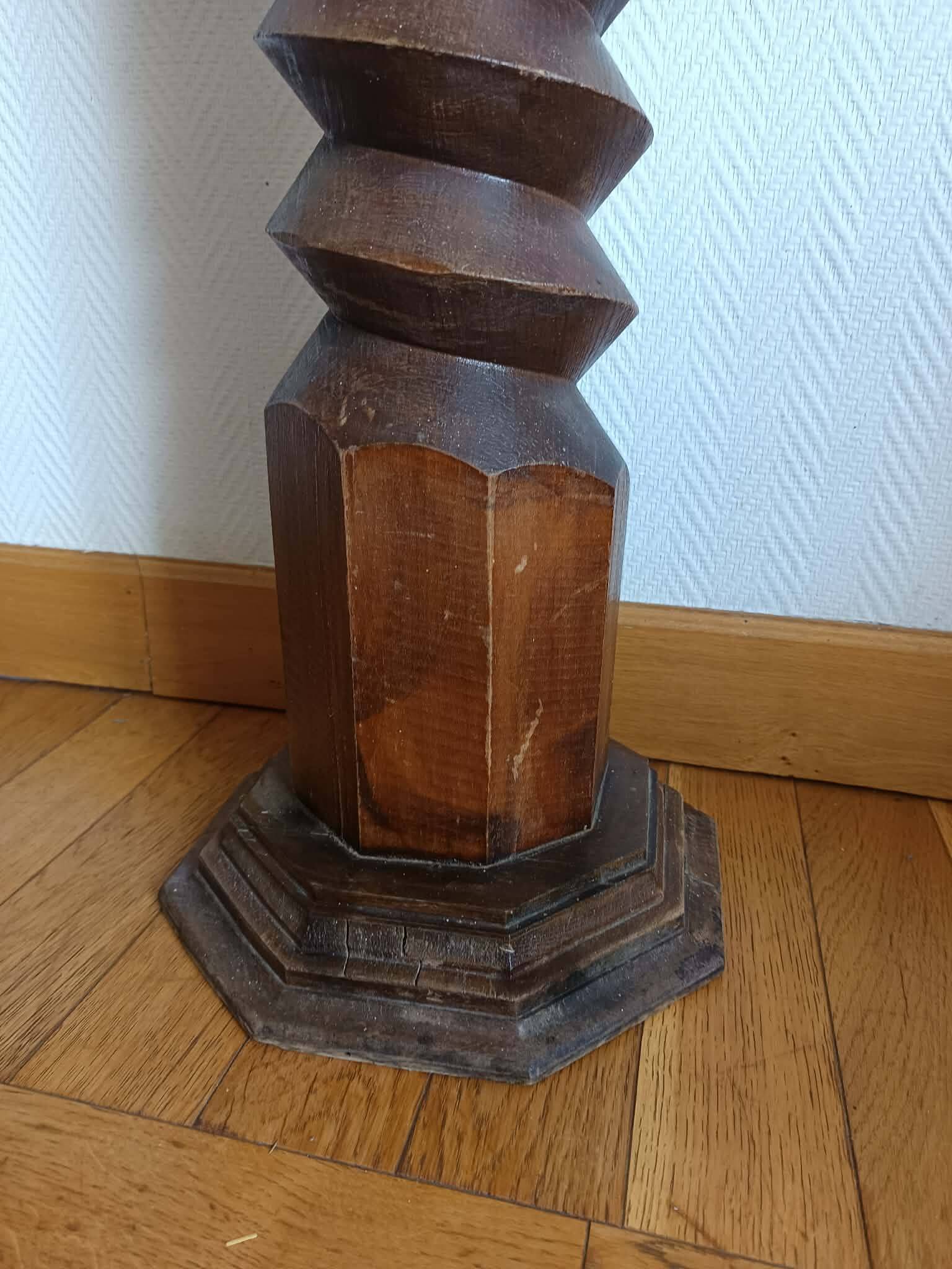 Screw press stool in carved wood