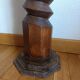 Screw press stool in carved wood