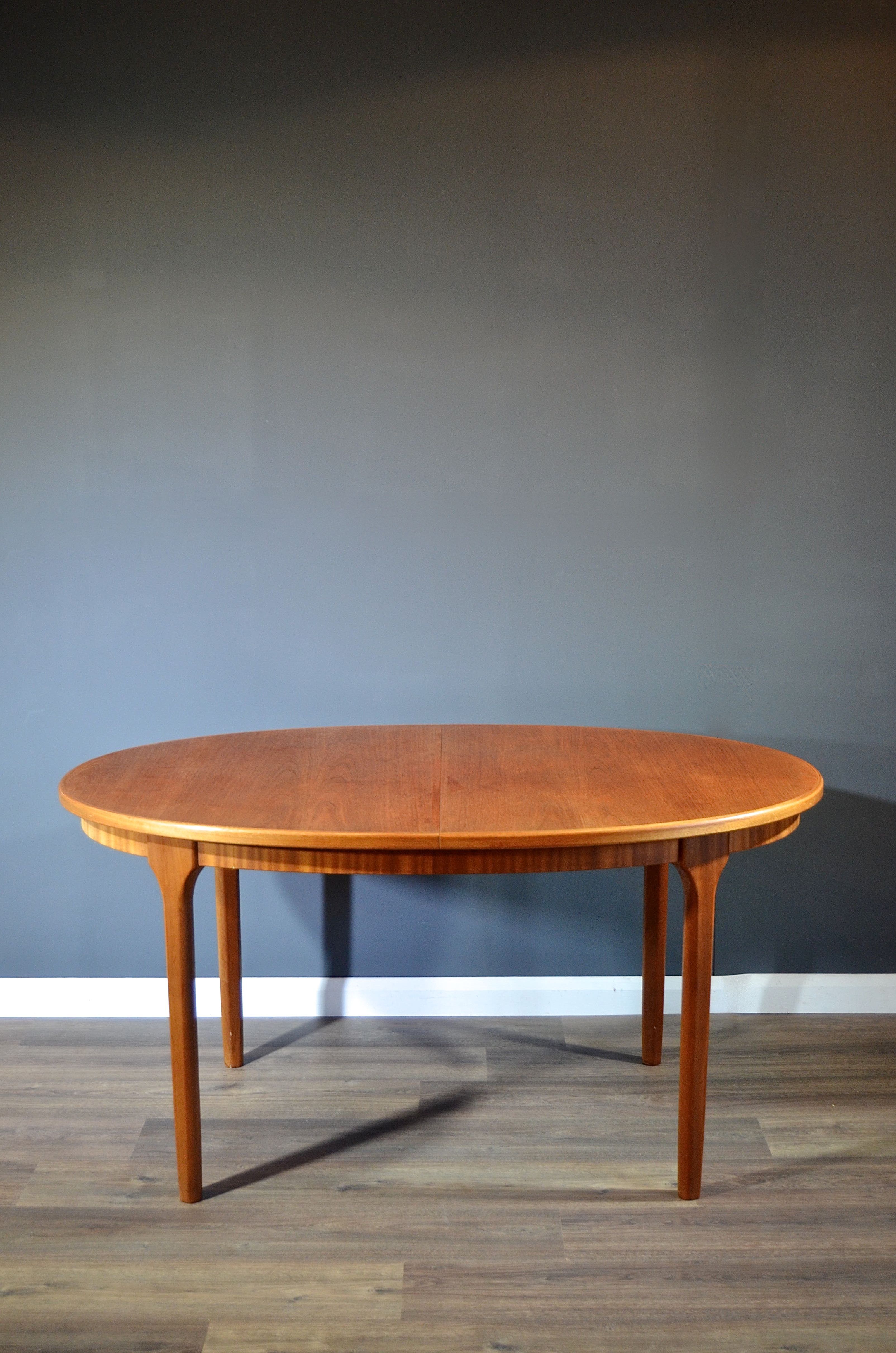 McIntosh Oblong Teak Extending Table.