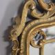 MIROIR MURAL DU DÉBUT DU XXE SIÈCLE EN BOIS DORÉ DE STYLE BAROQUE